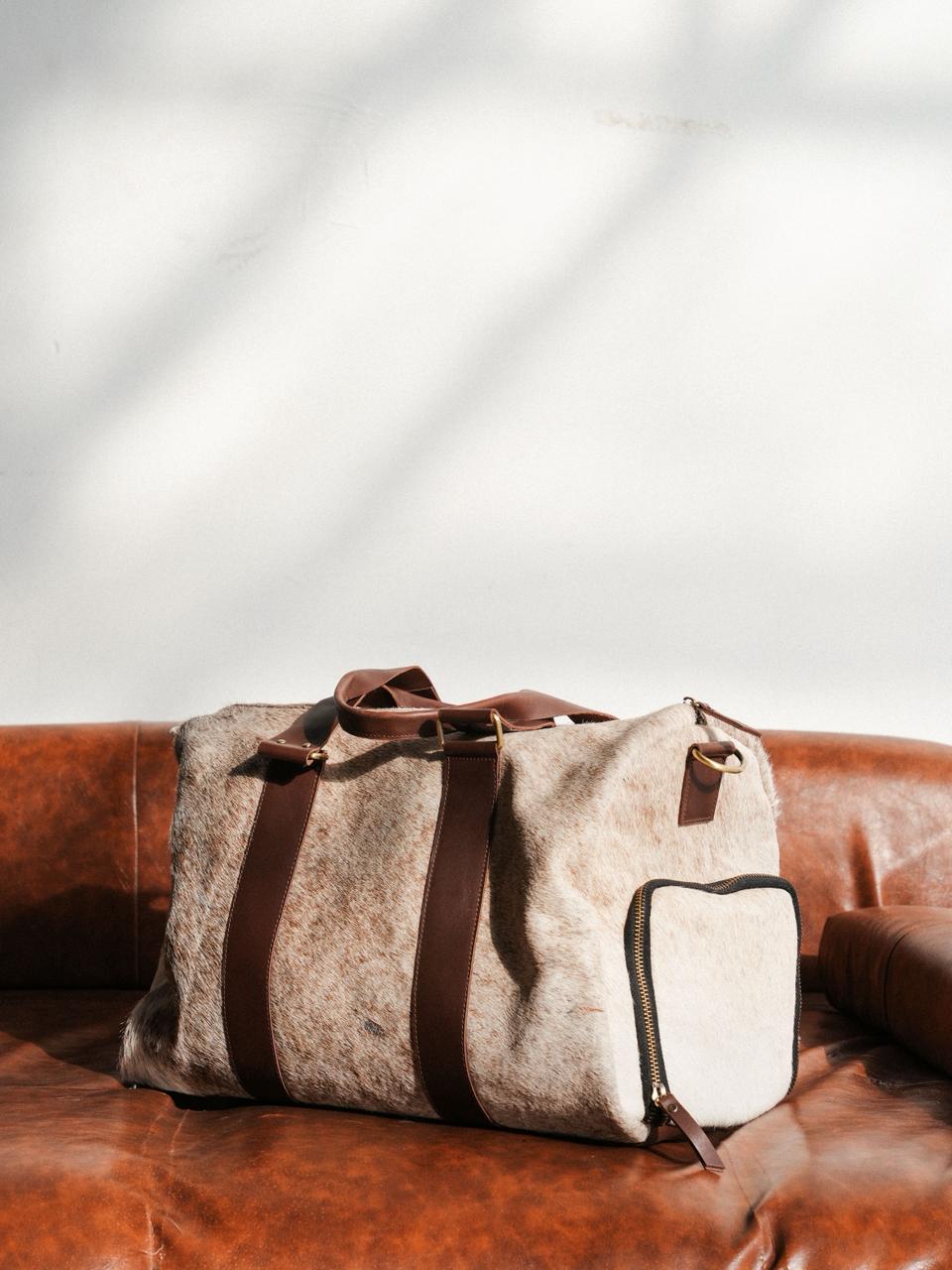 COWHIDE DUFFEL BAG