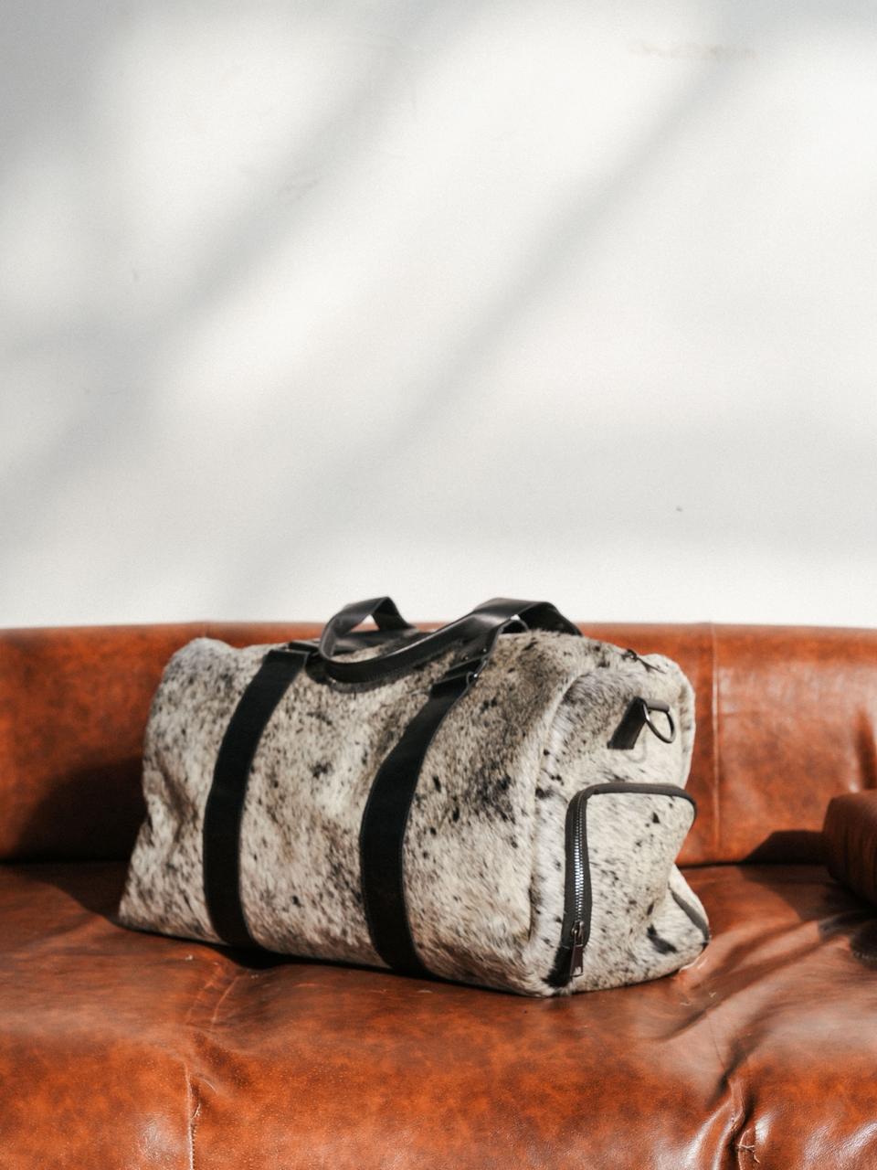 COWHIDE DUFFEL BAG