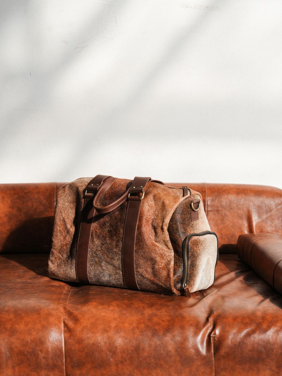 COWHIDE DUFFEL BAG