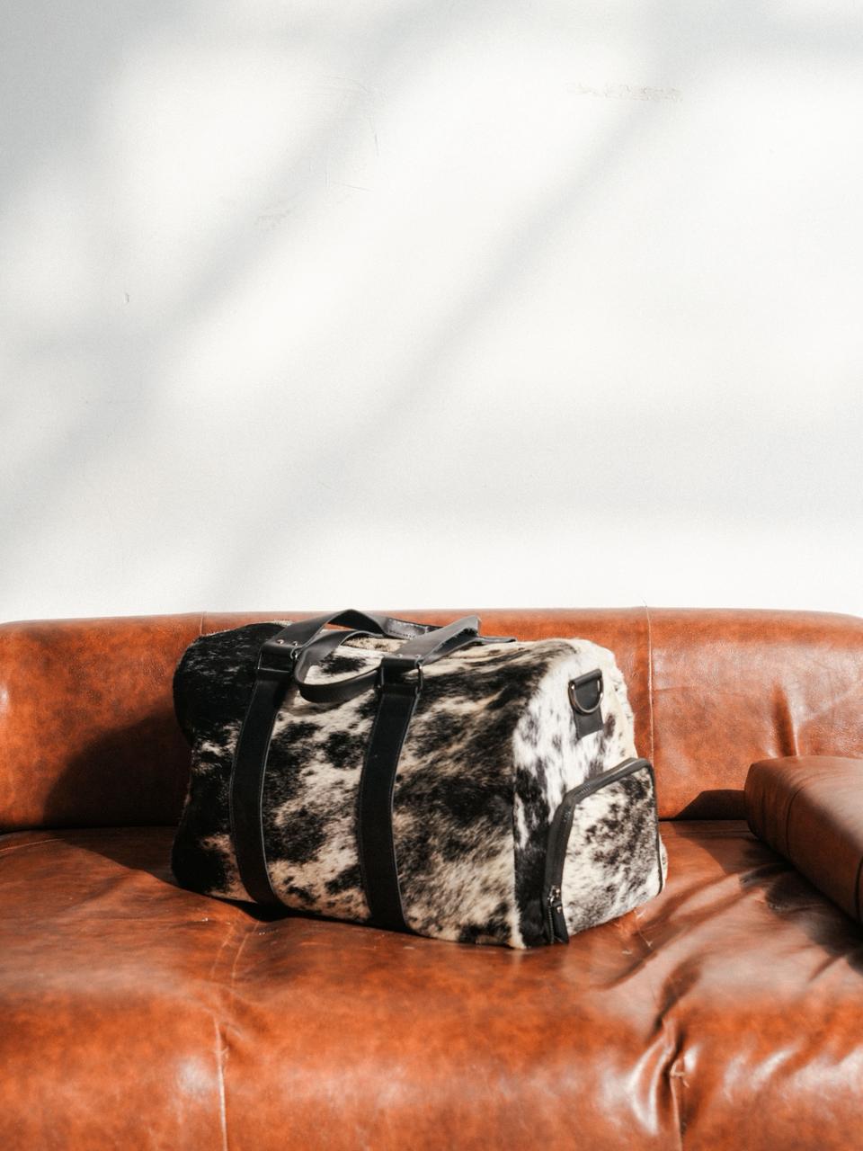 COWHIDE DUFFEL BAG